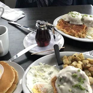 Chicken fried chicken, sawmill sausage gravy, pancakes, peasant potatoes, eggs, coffee.