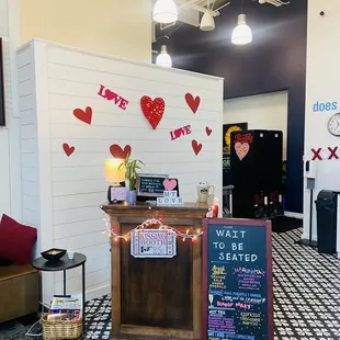 a sign in the lobby of a restaurant