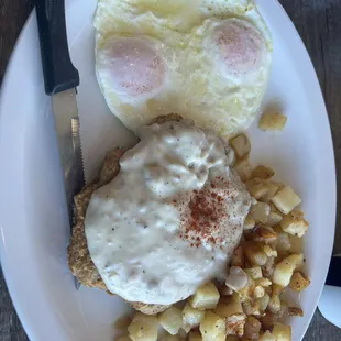 Chicken fried steak and eggs.