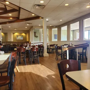 a restaurant with tables and chairs