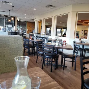 a restaurant with tables and chairs