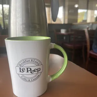 a coffee mug on a table