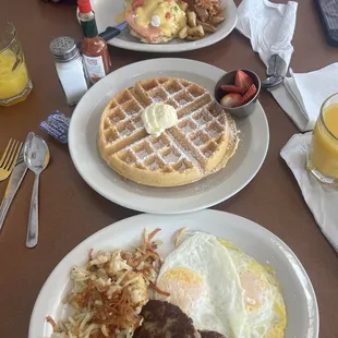 Salmon Benedict's and waffle eggs sausage hash