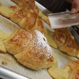 Powdering Frangipane Croissants