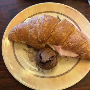 Tavern ham, egg and cheese on croissant served with a homemade mini brownie