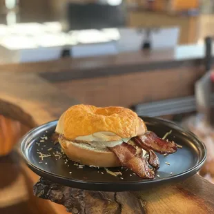 a breakfast sandwich on a plate