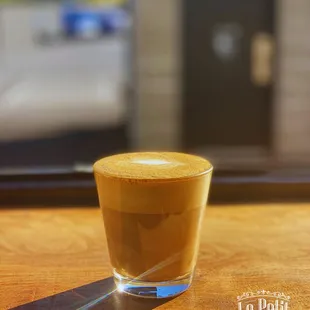 a cup of coffee on a table