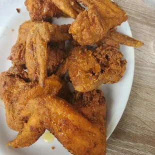Chicken with a honey or maple drizzle fried to perfection