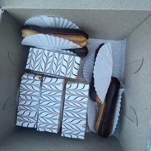 eclairs (chocolate) and napoleon (white frosting)