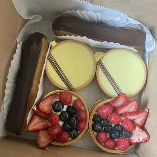 Lemon tart, fruit tart, chocolate eclairs.