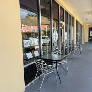 tables and chairs outside a restaurant