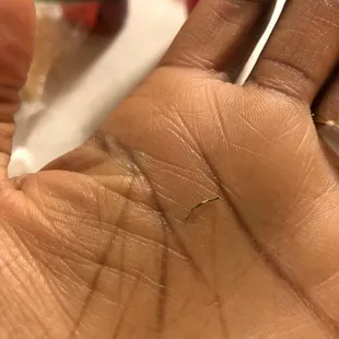 This metal piece in my food. Thank God I didn't swallow it.