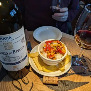 A delicious bottle of Rioja with Peruvian Ceviche and plantain chips