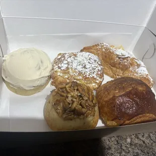 Cinnamon roll, pecan roll, pain au chocolat, almond croissant, chocolate almond croissant