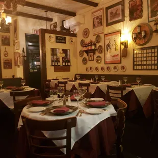 a dining room with tables and chairs