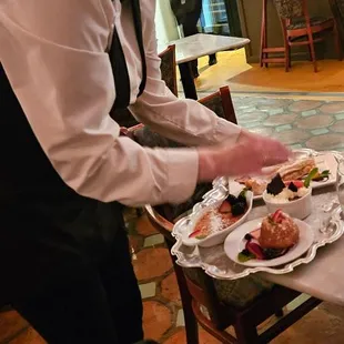 Friendly waitress with Dessert Tray