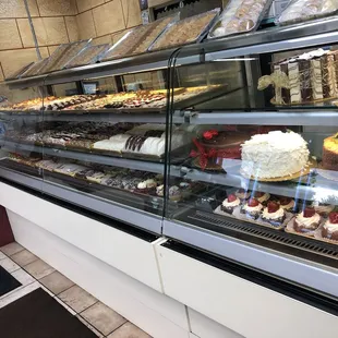 a display of cakes and pastries