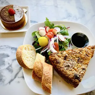The Mushroom Quiche Set with greens, French bread, and olive oil. Perfect for sharing!