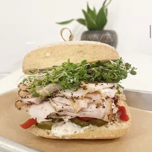 a chicken sandwich on a tray