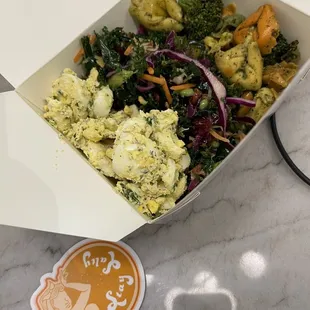 A colorful salad trio to-go with the delightful egg salad, slaw crunch, and cheese tortellini. Also check the stay salty sticker.