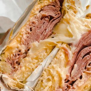 a closeup of a cut in half sandwich