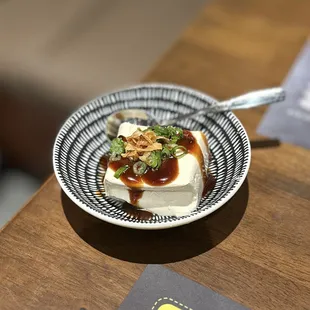 G1. Chilled Tofu: Vegan Oyster Sauce topped w/fried shallots &amp; green onions | $3.95