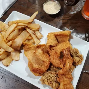 2 pieces of Trout, 4 oysters and gumbo shrimp with fries