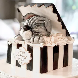 a black and white cake decorated with a zebra