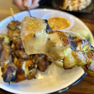Chicken Satay - closeup after dipping into the peanut sauce. Excellent!!