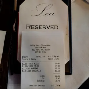 The reserved card says 'Lea'. Take a look at our receipt - Bobby Van's