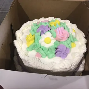 26 March 2019 -- Marble cake with a spring flowers icing. The cake is a mixture of vanilla and chocolate.