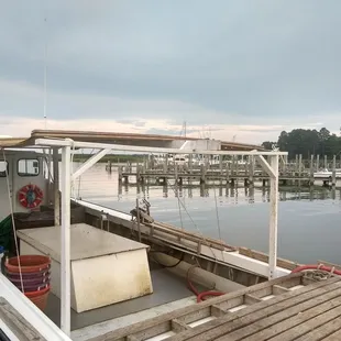 a boat docked at a dock