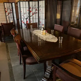 a dining room table and chairs