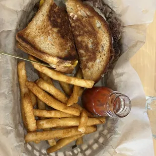 Frisco melt crispy fries and Ketchup