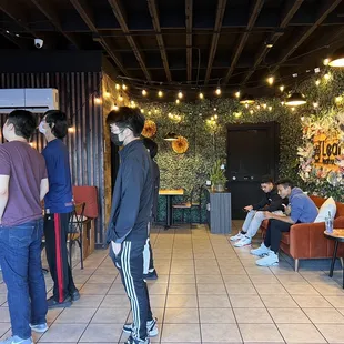 a group of people in a cafe