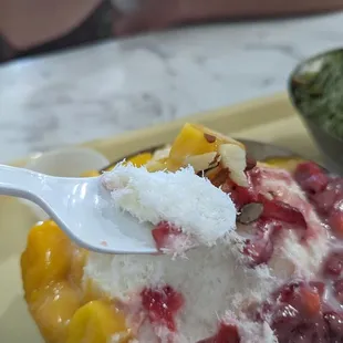 Spoonful of strawberry   bingsu