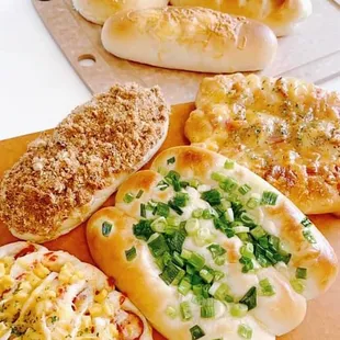 Scallion bun, corn &amp; sausage bun, Russian bread (dense bread) etc.