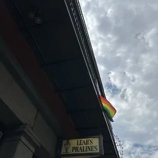 a rainbow flag on a building