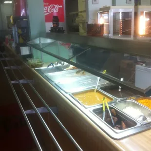 a view of a buffet with a variety of food items