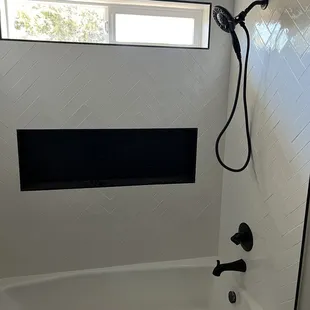 a bathtub and shower