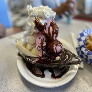 a banana split and chocolate sauce