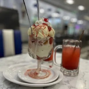  ice cream, strawberries, and whipped cream