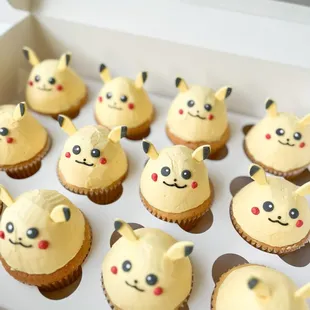 Pikachu cupcakes with passion fruit buttercream frosting.