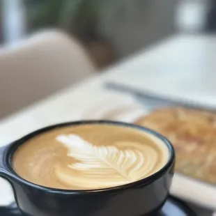 a cup of coffee on a saucer
