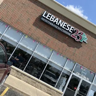 a car parked in front of a restaurant