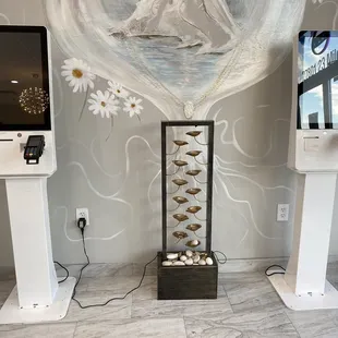 a wall mural of a ship and a heart