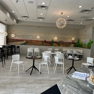 With Design by Vondom, Painting and Art Work by Artist Ahmad Abouzeid Vondom Africa Chairs &amp; Barstools by Eugeni Quitllet  Vondom Mar-isol