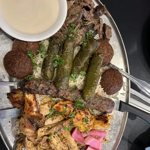 a plate of meat and vegetables