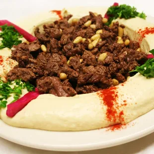 Only Chef Mike knows the real taste of "HUMMUS".  Best with tips of Beef, Lamb or Chicken on top, at Lebanese Grill