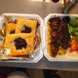 Rice, lamb, chicken meat pie, hummus, salad